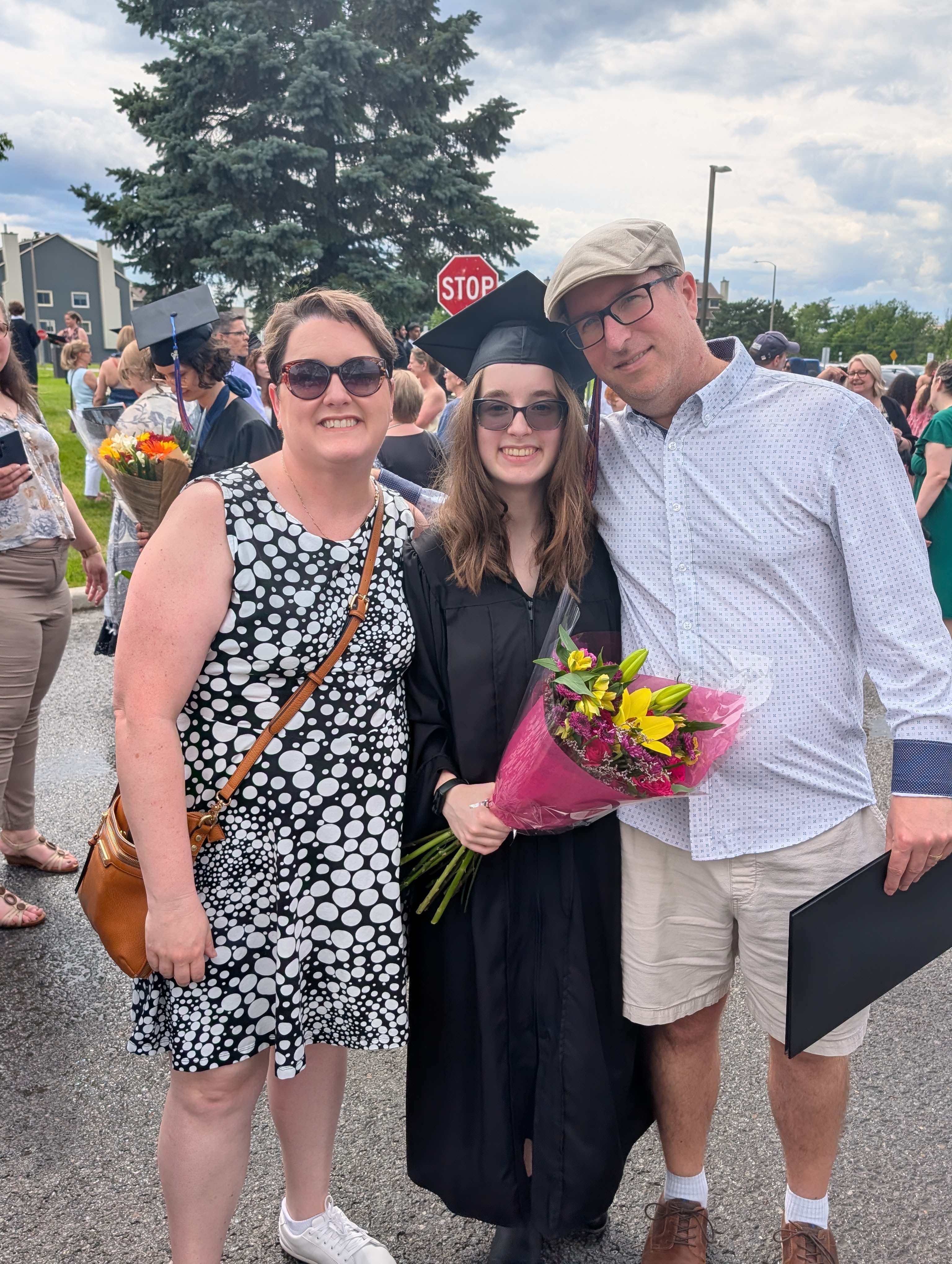 Jennifer, Natalie, and Rob at Natalie's high school graduation