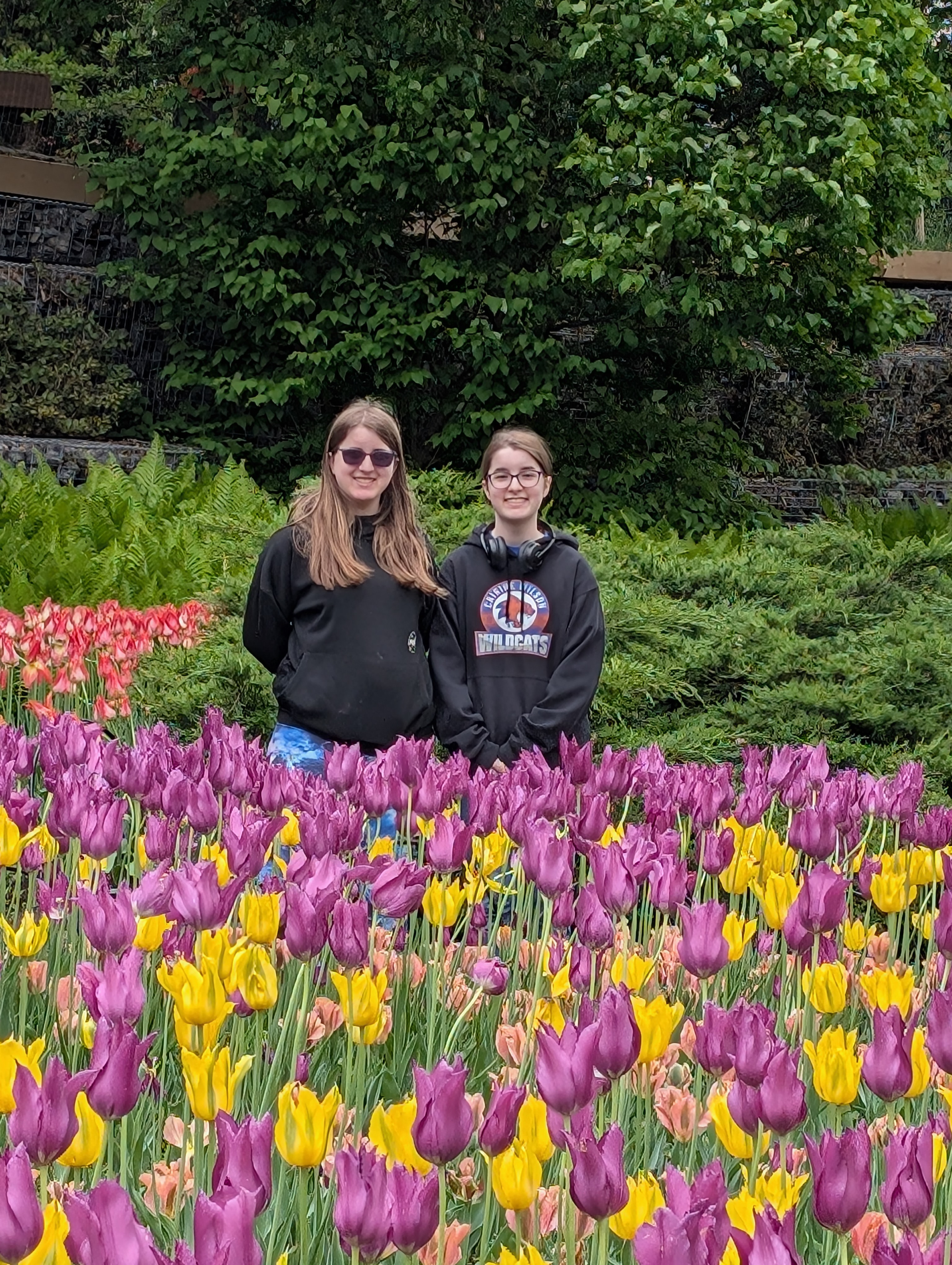 Natalie and Kaitlyn surrounded by tulips at the Ottawa Tulip Festival