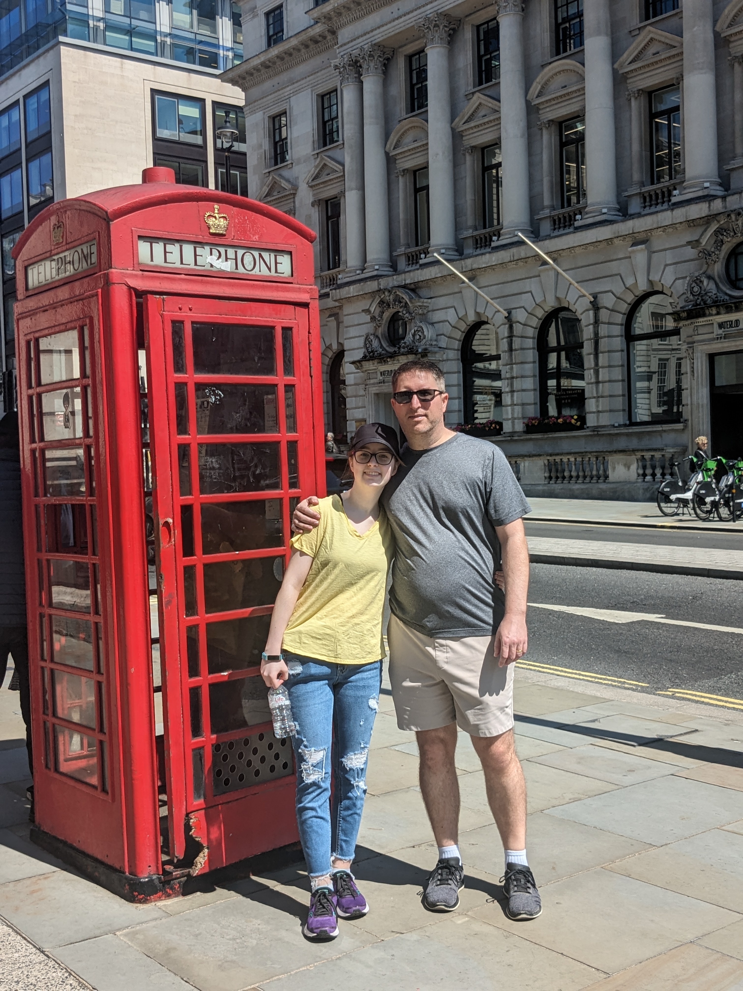 Natalie and Rob at a red London phone box